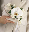 white orchid purse corsage
